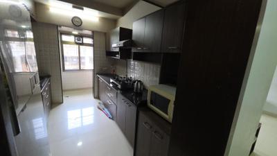 Kitchen Image of 1400 Sq.ft 3 BHK Apartment / Flat for rent in Ekta Meadows, Borivali East Mumbai for Rs. 110000