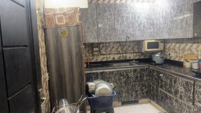Kitchen Image of 614 Sq.ft 1 BHK Builder Floor for rent in Patel Nagar New Delhi for Rs. 18292