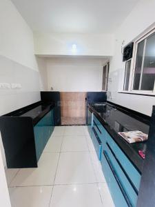 Kitchen Image of 950 Sq.ft 2 BHK Apartment / Flat for rent in Pharande Puneville, Punawale Pune for Rs. 24000
