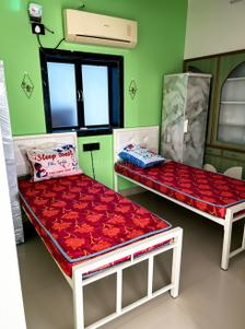 Bedroom Image of Blue Orchid’s Nest – Premium Girls PG in Nerul, Navi Mumbai