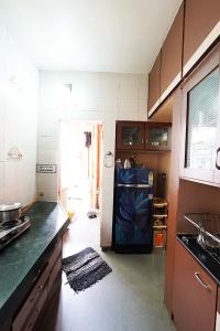 Kitchen Image of 675 Sq.ft 1 BHK Apartment / Flat for sale in Shivanand Apartment, Ghatlodiya Ahmedabad for Rs. 4300000