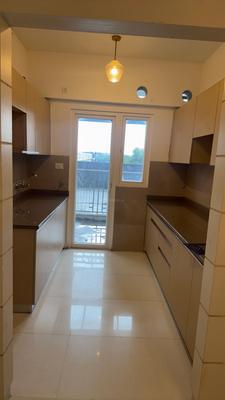 Kitchen Image of 989 Sq.ft 3 BHK Apartment / Flat for sale in Arihant Abode, Noida Extension Greater Noida for Rs. 15459710