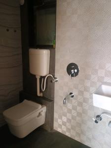 Common Bathroom Image of 781 Sq.ft 1 BHK Apartment / Flat for sale in Jhalak Fourwings, Ambernath East Ambernath for Rs. 3500000
