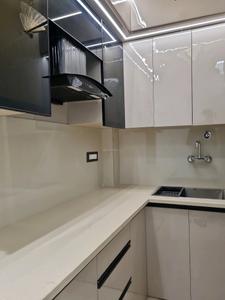 Kitchen Image of 600 Sq.ft 2 BHK Apartment / Flat for sale in Hans Builders Floor, Dwarka Mor New Delhi for Rs. 3900000