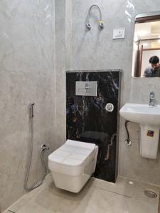 Common Bathroom Image of 550 Sq.ft 2 BHK Apartment / Flat for sale in Dwarka Mor New Delhi for Rs. 3654321