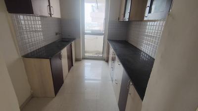 Kitchen Image of 950 Sq.ft 2 BHK Apartment / Flat for rent in Pinnacle D Dreams, Nipania Indore for Rs. 23000