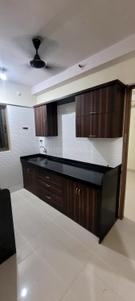 Kitchen Image of 660 Sq.ft 1 BHK Apartment / Flat for sale in Vishesh Balaji Symphony Wing I to K, Shilottar Raichur Navi Mumbai for Rs. 5300000