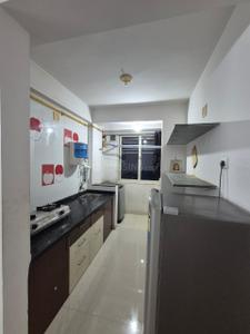 Kitchen Image of 981 Sq.ft 2 BHK Apartment / Flat for rent in Swagat Blossom, Sargasan Gandhinagar for Rs. 27000