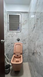 Bathroom Image of 560 Sq.ft 1 BHK Apartment / Flat for rent in Unnati Woods Phase 7, Kasarvadavali Thane for Rs. 23000