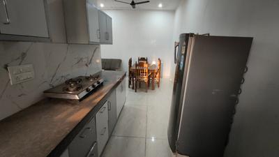Kitchen Image of 1080 Sq.ft 2 BHK Builder Floor for rent in Bakshish Gulmohar City, Sector 115 Mohali for Rs. 18000