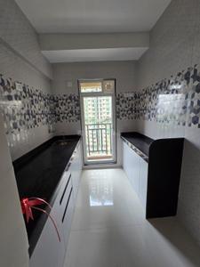 Kitchen Image of 550 Sq.ft 1 BHK Apartment / Flat for rent in Raunak Bliss, Kasarvadavali Thane for Rs. 20000