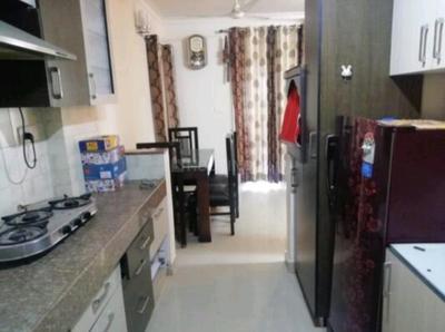 Kitchen Image of 1027 Sq.ft 2 BHK Apartment / Flat for rent in Mahima Panorama, Karolan Ka Barh Jaipur for Rs. 28000