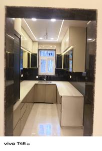 Kitchen Image of 1350 Sq.ft 4 BHK Builder Floor for rent in Janakpuri New Delhi for Rs. 50000