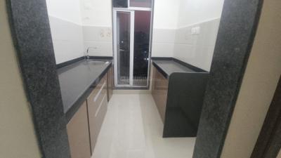 Kitchen Image of 560 Sq.ft 1 BHK Apartment / Flat for rent in Shriraam Pushpanjali Residency, Thane West Thane for Rs. 22000