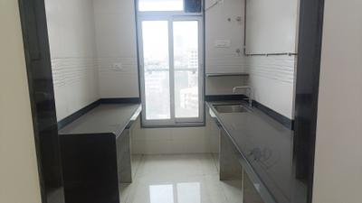 Kitchen Image of 700 Sq.ft 2 BHK Apartment / Flat for sale in Triumph Swastik, Malad West Mumbai for Rs. 23500000