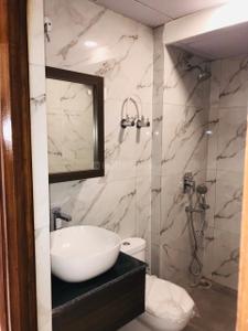 Bathroom Image of 900 Sq.ft 2 BHK Apartment / Flat for sale in City Grace, Bamheta Village Ghaziabad for Rs. 7700000
