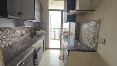 Kitchen Image of 1085 Sq.ft 2 BHK Apartment / Flat for rent in Angel Jupiter, Indirapuram Ghaziabad for Rs. 23000