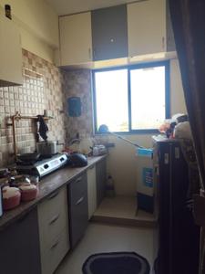 Kitchen Image of 1050 Sq.ft 2 BHK Apartment / Flat for sale in Signature Vrajdham, Ujala Circle Ahmedabad for Rs. 3500000