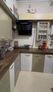 Kitchen Image of 902 Sq.ft 2 BHK Apartment / Flat for sale in Vijay Yashraj Park, Koliwada Thane for Rs. 7999999