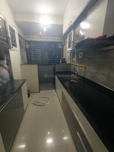 Kitchen Image of 980 Sq.ft 1 BHK Apartment / Flat for rent in Pramukh Sahaj, Chala Vapi for Rs. 13000