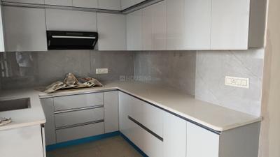 Kitchen Image of 1300 Sq.ft 3 BHK Apartment / Flat for sale in Dwarkadhish The Cubix, Sector 23 Dharuhera for Rs. 7350000