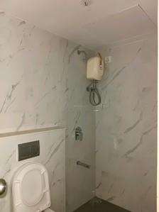 Common Bathroom Image of 1125 Sq.ft 3 BHK Apartment / Flat for rent in Lodha Palava Downtown, Dombivli East Thane for Rs. 25000