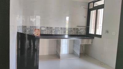 Kitchen Image of 950 Sq.ft 2 BHK Apartment / Flat for sale in Vardhaman Tower, Padle Gaon Thane for Rs. 6150000