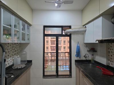 Kitchen Image of 690 Sq.ft 1 BHK Apartment / Flat for sale in Kini Tower, Virar West Virar for Rs. 4300000