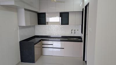 Kitchen Image of 987 Sq.ft 2 BHK Apartment / Flat for rent in Woods Ville, Moshi Pune for Rs. 22000