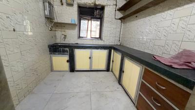 Kitchen Image of 900 Sq.ft 2 BHK Apartment / Flat for sale in Sant Niwruti, Goregaon East Mumbai for Rs. 19000000