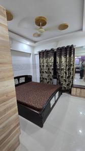 Bedroom Image of 850 Sq.ft 2 BHK Apartment / Flat for rent in JT JT Stuti Highland, Mughal Sarai Surat for Rs. 26000