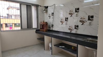 Kitchen Image of 810 Sq.ft 2 BHK Apartment / Flat for rent in Shivaji Nagar Mumbai for Rs. 54000