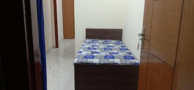 Bedroom Image of Saini PG in Sunlight Colony, New Delhi