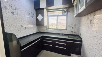 Kitchen Image of 950 Sq.ft 2 BHK Apartment / Flat for rent in Ashapura Jayram Heights, Dombivli East Thane for Rs. 19500