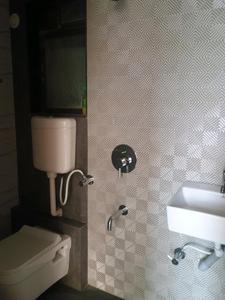 Common Bathroom Image of 708 Sq.ft 1 BHK Apartment / Flat for sale in Laukik Vastu Luxuria, Dombivli East Thane for Rs. 4399000