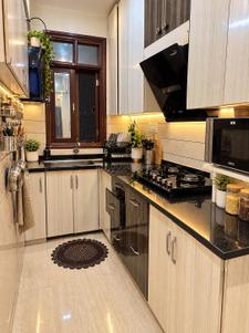 Kitchen Image of 850 Sq.ft 2 BHK Builder Floor for rent in Sector 22 Rohini New Delhi for Rs. 18000