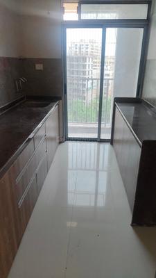 Kitchen Image of 715 Sq.ft 1 BHK Apartment / Flat for sale in Krishna Ultima, Kalyan East Kalyan for Rs. 4200000