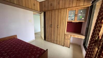 Bedroom Image of 1350 Sq.ft 2 BHK Apartment / Flat for rent in Kopar Khairane Navi Mumbai for Rs. 50000