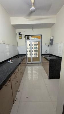 Kitchen Image of 720 Sq.ft 2 BHK Apartment / Flat for rent in Rustomjee Azziano, Thane West Thane for Rs. 44000