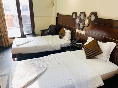 Bedroom Image of Sneha Corporates Girls PG in DLF Phase 2, Gurgaon