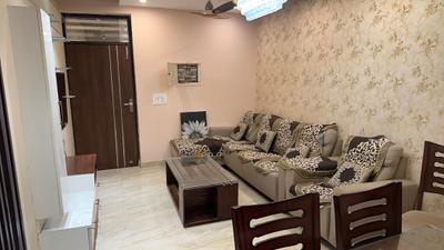 Living Room Image of 1065 Sq.ft 2 BHK Apartment / Flat for sale in Hewo Apartments II, Sector 56 Gurgaon for Rs. 18500000
