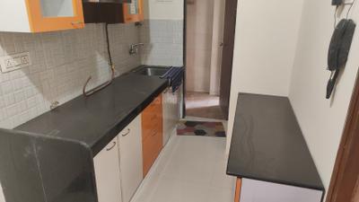 Kitchen Image of 538 Sq.ft 1 BHK Apartment / Flat for rent in Bhoomi Acres, Hiranandani Estate Thane for Rs. 23000