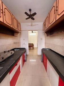 Kitchen Image of 900 Sq.ft 2 BHK Apartment / Flat for sale in Sudarshan Sky Garden, Kasarvadavali Thane for Rs. 9450000