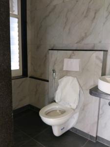 Common Bathroom Image of 649 Sq.ft 1 BHK Apartment / Flat for sale in Siddhivinayak Unique Estate Type C Wing D, Mira Road East Mira Bhayandar for Rs. 7125000