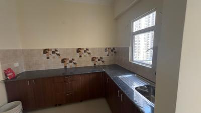 Kitchen Image of 1220 Sq.ft 3 BHK Apartment / Flat for sale in Amrapali Verona Heights, Noida Extension Greater Noida for Rs. 8865000
