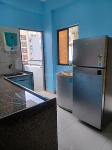 Kitchen Image of 780 Sq.ft 2 BHK Apartment / Flat for rent in Aum Param, Bill Vadodara for Rs. 17000