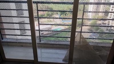 Bedroom Image of 690 Sq.ft 1 BHK Apartment / Flat for sale in Gajra Bhoomi Lawns, Shilgaon Thane for Rs. 3800000