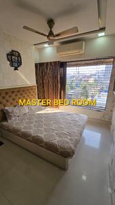 Bedroom Image of 550 Sq.ft 2 BHK Apartment / Flat for sale in Malad Shopping Centre CHS, Malad West Mumbai for Rs. 14500000