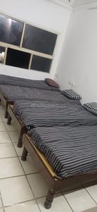 Bedroom Image of Yash pg in Ambawadi, Ahmedabad