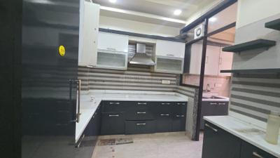 Kitchen Image of 1350 Sq.ft 3 BHK Builder Floor for rent in Pitampura New Delhi for Rs. 50000